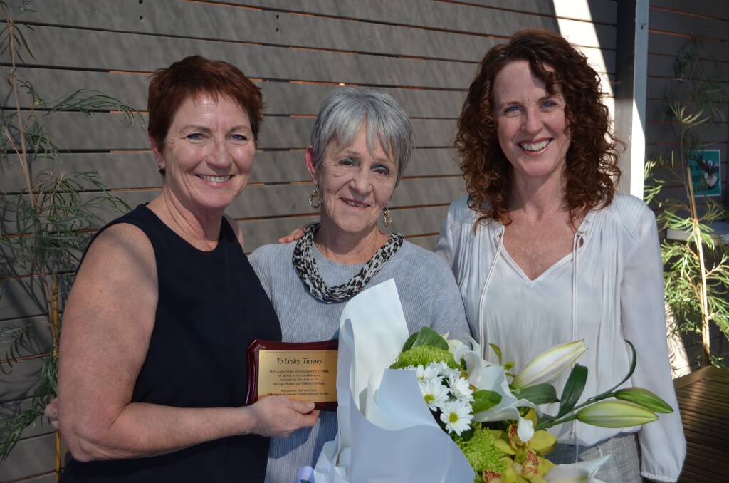 Chair of the board Margaret Morgan (left) and chief executive officer Gemma Morley (right) thank Lesley Tierney for her commitment to women and children experiencing domestic and family violence.
