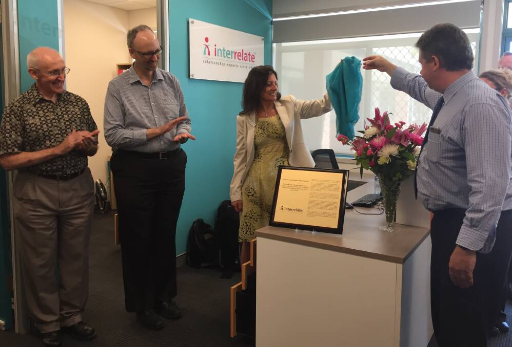 Official opening: Interrelate chief executive officer Patricia Occelli and Interrelate Board chairman Alan Gibson unveil a plaque in honour of late Anne and Graham Seton, as Mark and Colin Seton look on.