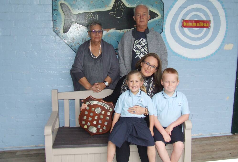 Generations of winners: Karen Clark, Robert Crossingham with Milly, Ava and Bayley Read (front row). Photo: supplied