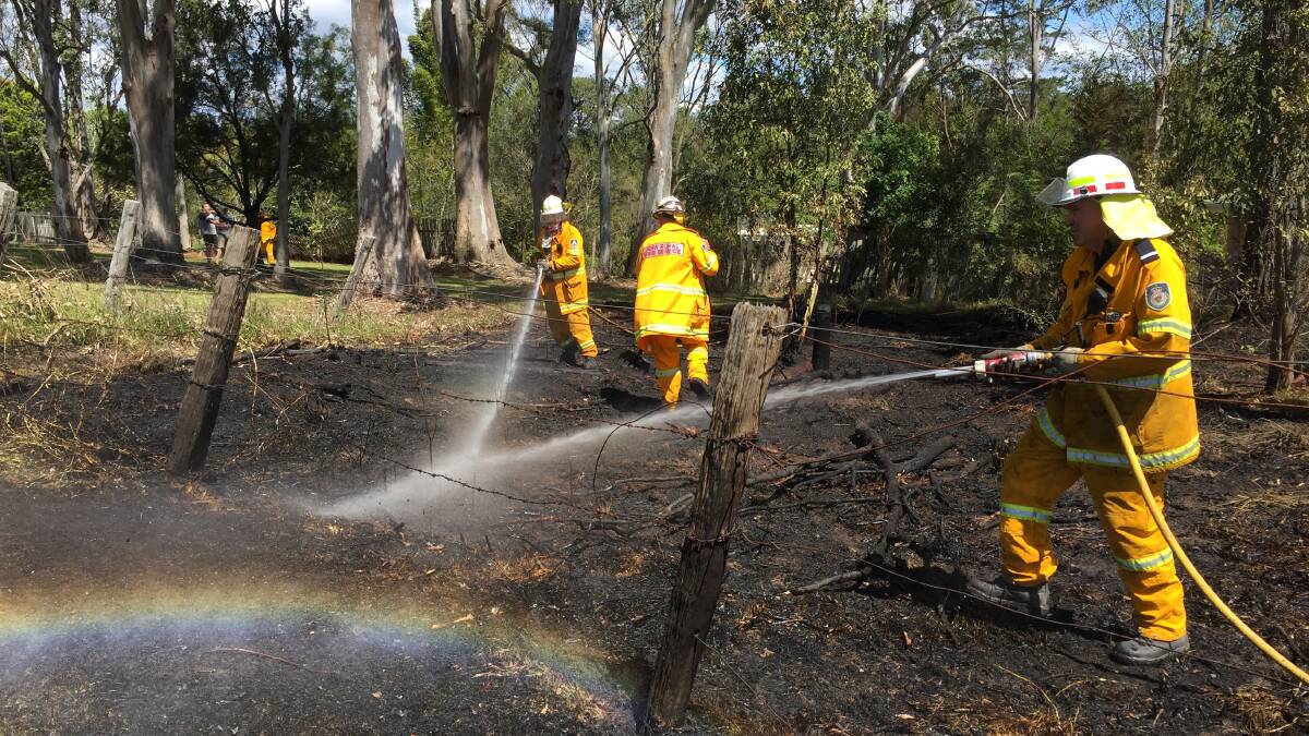 The Tinonee RFS in action in 2016 at a residential fire.