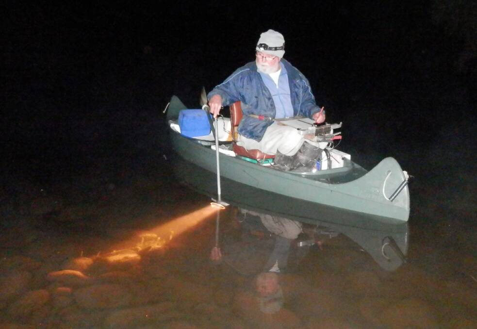 Night survey: Dr Keith Bishop says the times for surveying is whenever the conditions are "no wind, clean water and no rain." Sometimes that means he goes out at night. Photo: supplied