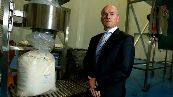 TPI Enterprises Managing Director Jarrod Ritchie with a bag of thebaine, a narcotic raw material, which has a commercial value of about $US600 a kilogram. Photo: Pat Scala