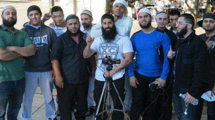 Kings Cross bouncer turned Islamic State recruiter Mohammad Ali Baryalei working for 
the Street Dawah movement in Sydney. Some of the men in the photo have travelled to the Middle East. Photo: Supplied