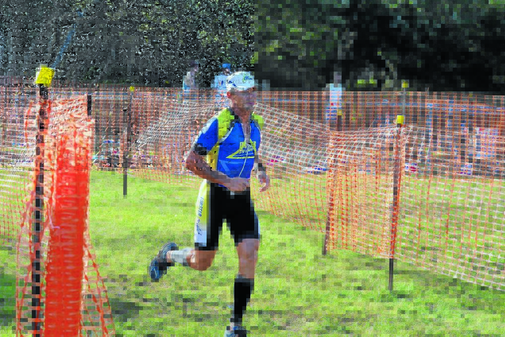 Richard Sewell contesting the Crowdy Head Triathlon in January. He ll start in the Australian Ironman race at Port Macquarie on Sunday.