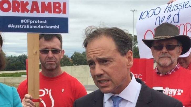 Health Minister Greg Hunt with Cystic Fibrosis Australia protesters. Photo: Georgina Connery