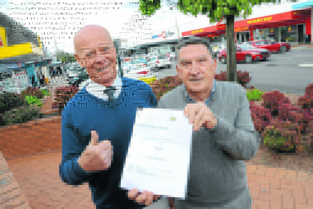 Acting Greater Taree City Council mayor Cr David West and Rotarian Ken Patterson give the CCTV contract a big thumbs up. Installation begins this month.
