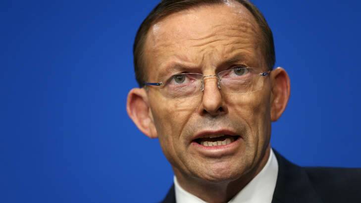 Prime Minister Tony Abbott says AFP on standby to help secure MH17 crash site. Photo: Alex Ellinghausen