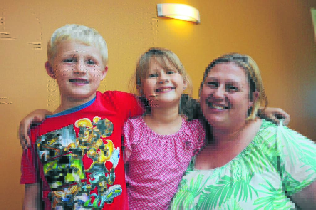 Looking for a bit more serenity: Mum Liz Cronk, with son Jensen and daughter Charlotte, is hoping a new positive parenting program can help her family.