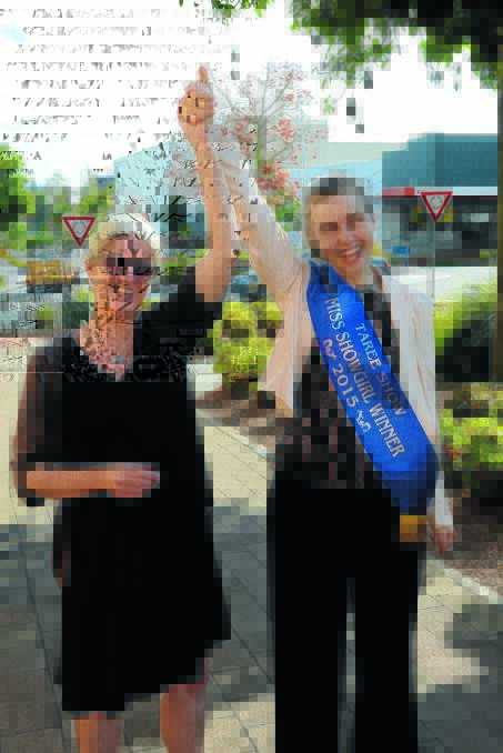 Manning River Times editor, Toni Bell celebrates the sashing of Times journalist, Laura Polson as Taree Show's 50th showgirl.