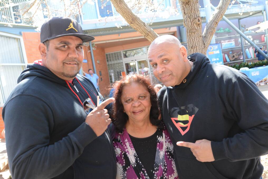 Clint Mitchell, Aunty Wilma Morcome and comedian Kevin Kropinyeri have a yarn at the start of the day.