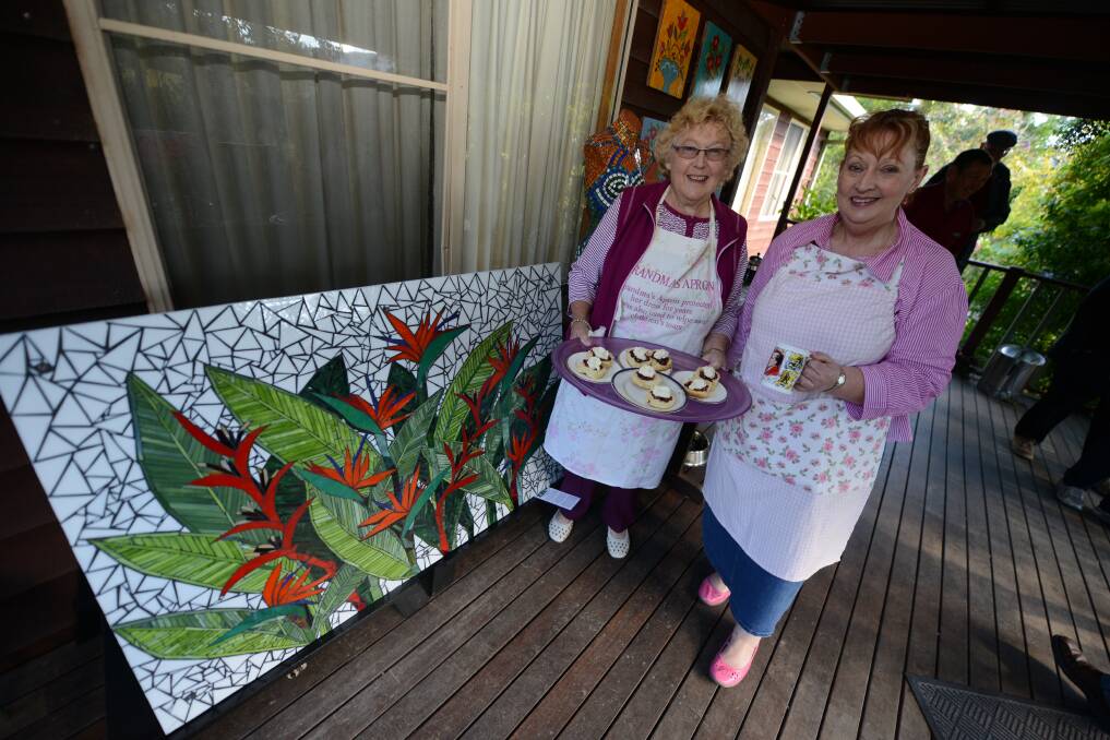 Janice Hoad and Helen Smith serve up some goodies.