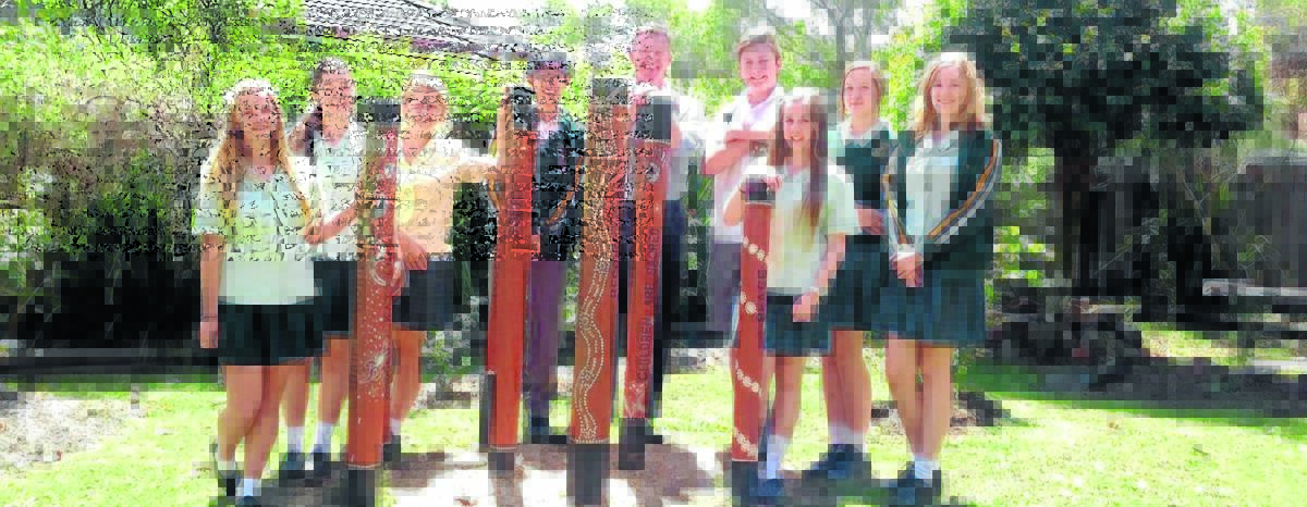Online campaign: Members of St Clare s High School s Human Rights group, Anna Rourke, Meagan Williamson, Elizabeth Mudford, student representative leader Kenneth Tsang, group co-ordinator Mr Phillip Chalmers, Jacob Bramble, Emily Banks, Tanith King and Lucy King. The group has around 80 members.