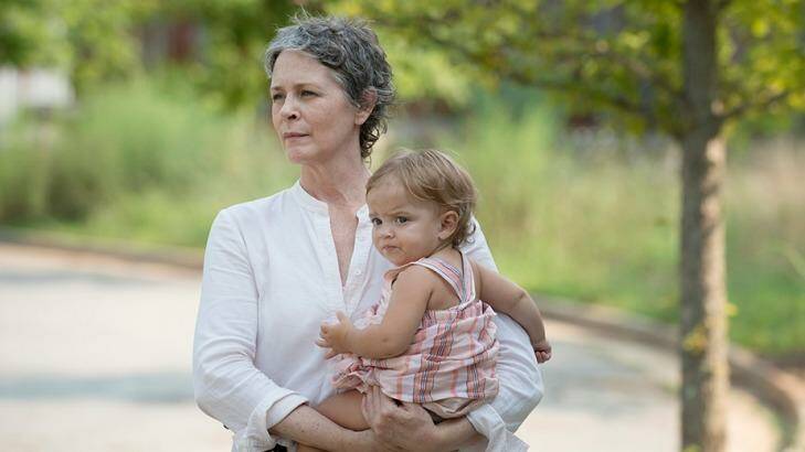 Carol (Melissa McBride) is left holding the baby, but not for long, in The Walking Dead season 6 episode 7 'Heads Up'. Photo: AMC