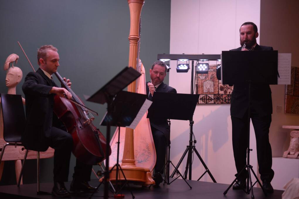 Cellist Michael Bardon, harpist Marshall McGuire and oboist Ben Opie perform the world premiere of a musical piece written by composer Andrew Chubb especially for the Manning Winter Festival. The performance was part of the Visual and Performing Arts Awards celebration. Julie Slavin photo.