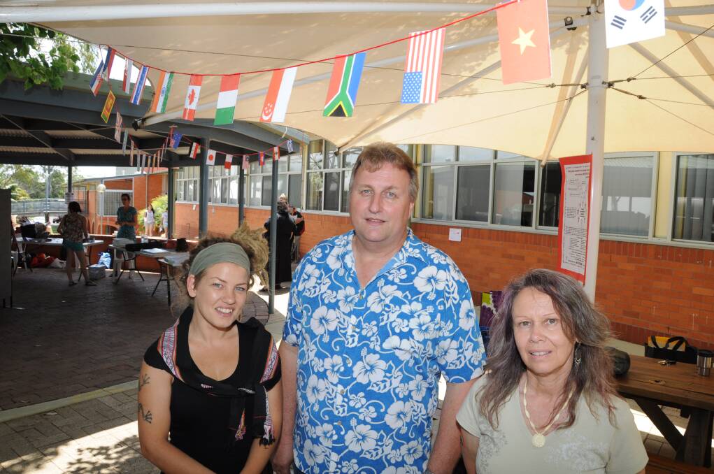 Jolene Saldeng, Bryce Steep and Kerry Fitzgerald at the Rural Community Cultural Exchange stall.