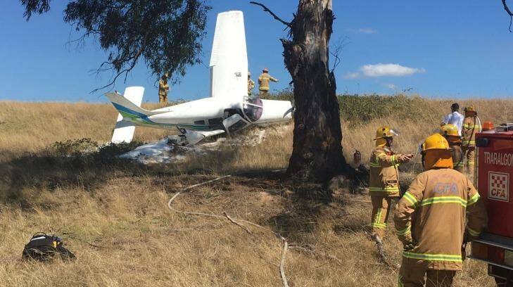 Emergency workers at the scene of the light plane crash near Traralgon. Photo: Bryce Eishold??/Latrobe Valley Express
