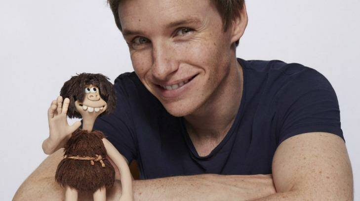 Eddie Redmaye with his caveman character Dug from the Aardman animation <i>Early Man</i>.
