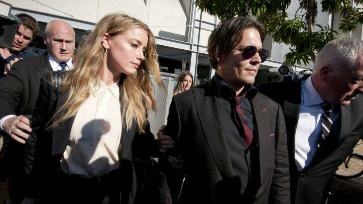 Actors Johnny Depp and wife Amber Heard leaving Southport Magistrates Court on Monday. Photo: Robert Shakespeare
