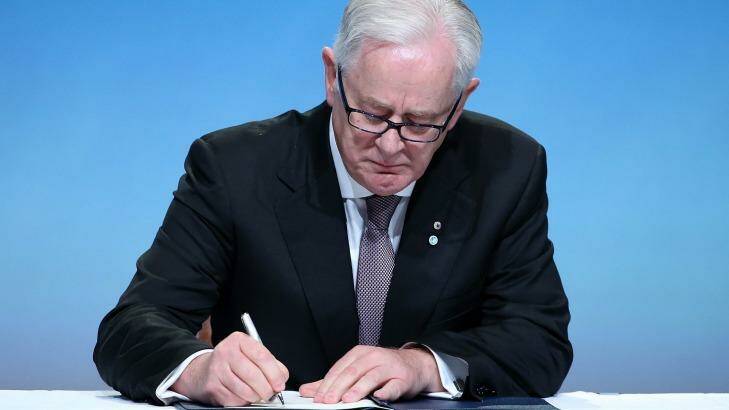 Australia's Minister of Trade and Investment Andrew Robb signs the Trans Pacific Partnership in Auckland, New Zealand, last week. Photo: Fiona Goodall