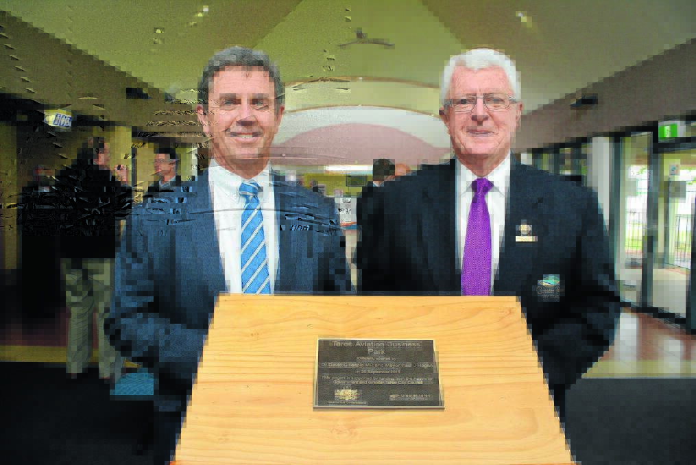 Milestone moment: Federal member for Lyne Dr David Gillespie and mayor Paul Hogan have officially opened Taree Airport's $3.1 million business precinct - the Taree Aviation Business Park.