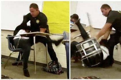 Images from a video taken by a Spring Valley High School student shows Senior Deputy Ben Fields flipping a girl to the ground and dragging her from the classroom. Photo: via AP