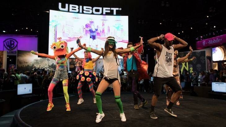 Performers promoting Just Dance 2017 at game publisher Ubisoft's booth. Photo: ESA