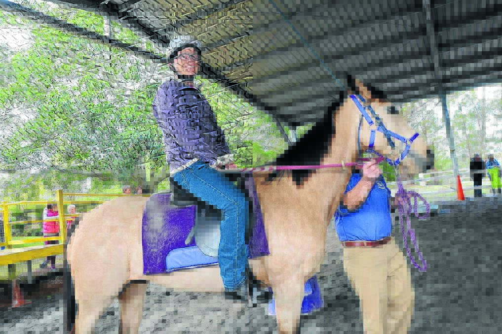 Right:?Dean Harvey takes part in the regional mounted games.