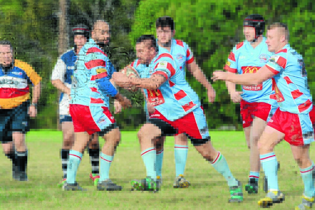 Old Bar prop Teia Ambrosoli takes the ball forward for the Clams in a clash against Manning Ratz this season.