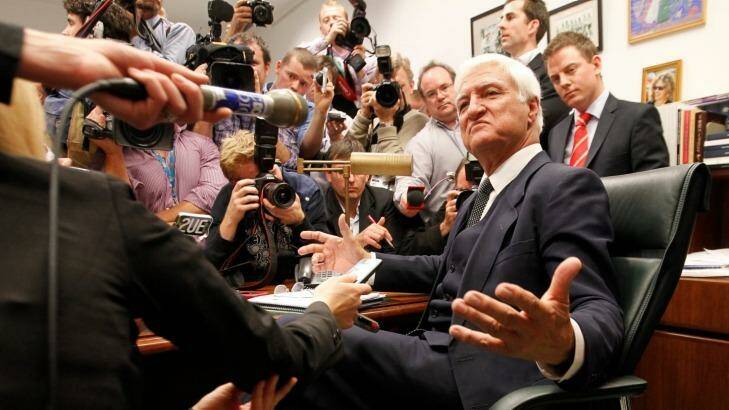 Bob Katter holds a press conference at his Parliament house desk to announce he will back the Coalition after the cliffhanger 2010 vote. Photo: Andrew Meares