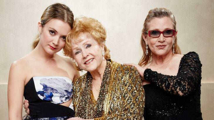 Billie Lourd with her mother Carrie Fisher and grandmother Debbie Reynolds at the Screen Actors Guild Awards in 2015. Photo: Kevin Mazur/WireImage