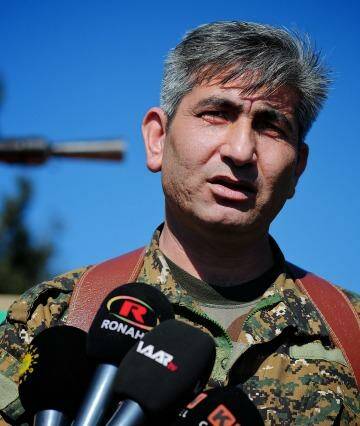 Redur Khalil, a spokesman for the Kurdish YPG militia, near the besieged town of Tel Hamis.  Photo: Fadi Yeni Turk