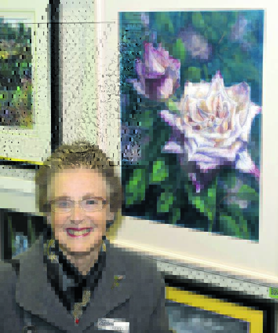 Beryl Moriarty with one of her artworks entered in last year's exhibition.