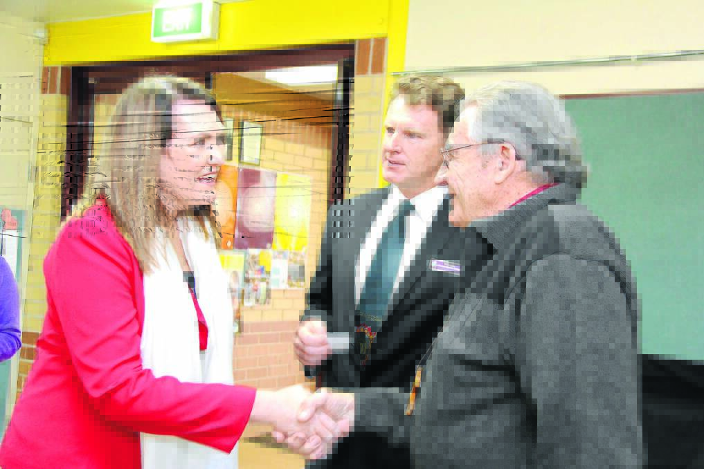 Senator Deborah O'Neill is introduced to Uncle Ray Hurst by teacher St Clare's Human Rights Group co-ordinator, Phillip Chalmers. Photo courtesy Aurora, Diocese of Maitland-Newcastle.