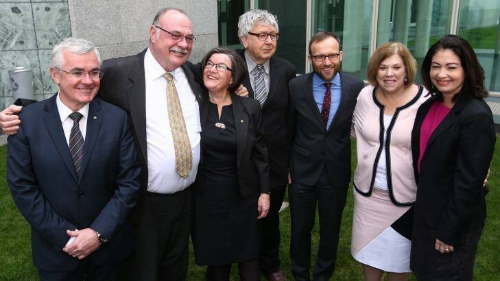 Warren Entsch with other MPs after he introduced a private member's bill on marriage equality with co-sponsers Andrew Wilkie, Cathy McGowan, Laurie Ferguson, Adam Bandt, Teresa Gambaro and Terri Butler. Photo: Andrew Meares