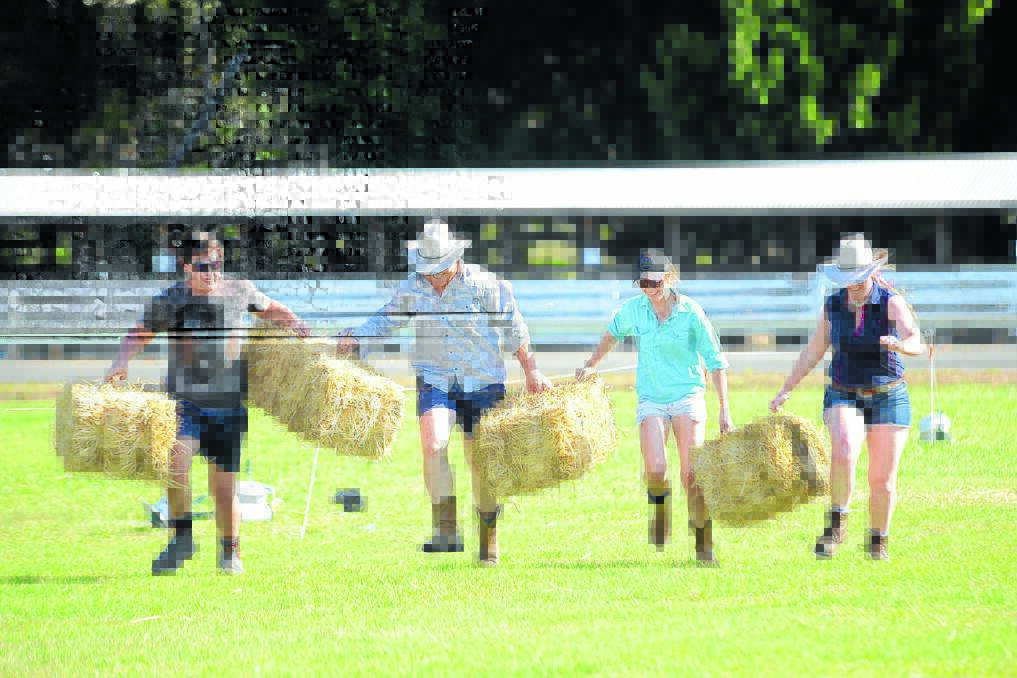 New to the Taree Show program this year was the Young Farmers Challenge. Joseph Wilde, Abbro and Amba Woolnough and Kim Harriden battle it out in the bale race.