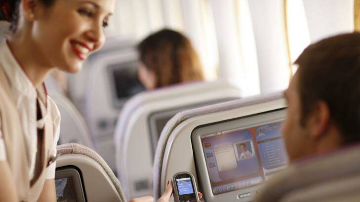 Emirates staff are happy to help passengers navigate the extensive onscreen entertainment selection. Photo: Supplied