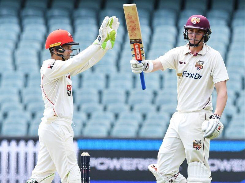 Queensland opener Matthew Renshaw scored a half century before lunch in the Shield game in SA.