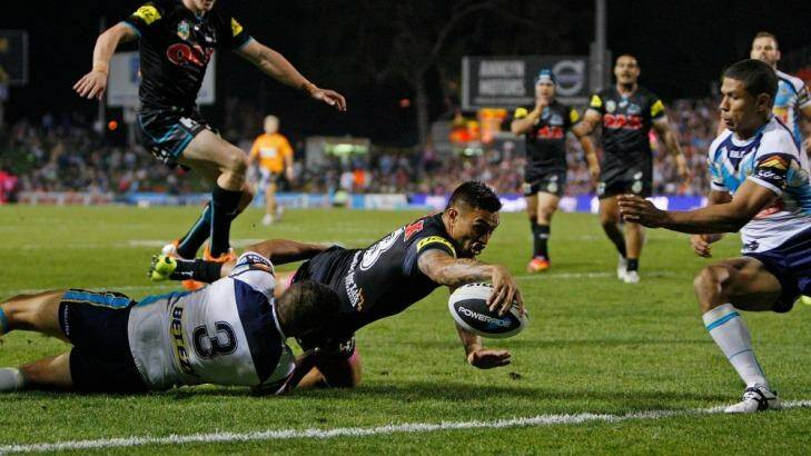 Black magic: Dean Whare goes over for the first try of the night for the Panthers