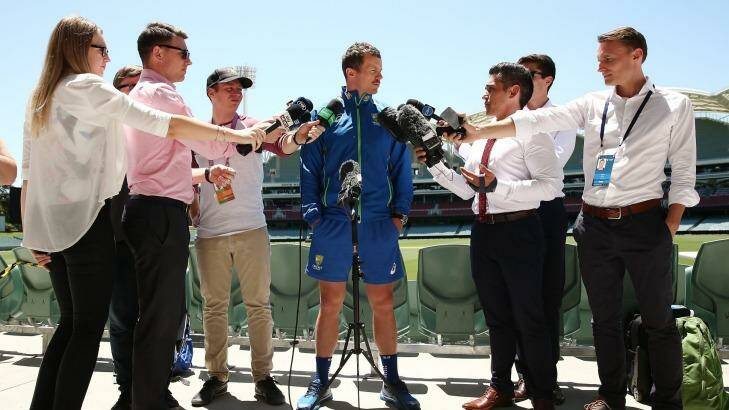 Middle man: Peter Siddle speaks to reporters before a nets session in Adelaide. Photo: Morne de Klerk