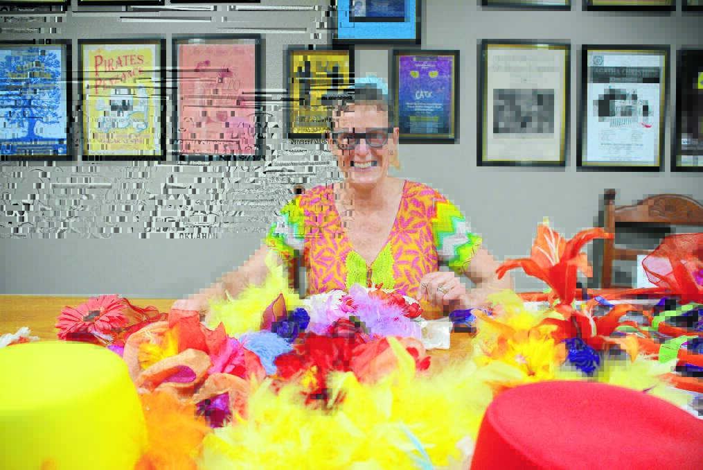 Sammy Clarke amongst the feathers and fabric as she creates costumes for the Supercalifragilisticexpialidocious scene.
