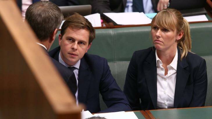 Opposition Leader Bill Shorten consults advisers Ryan Liddell and Kimberley Gardiner during question time in May.  Photo: Andrew Meares