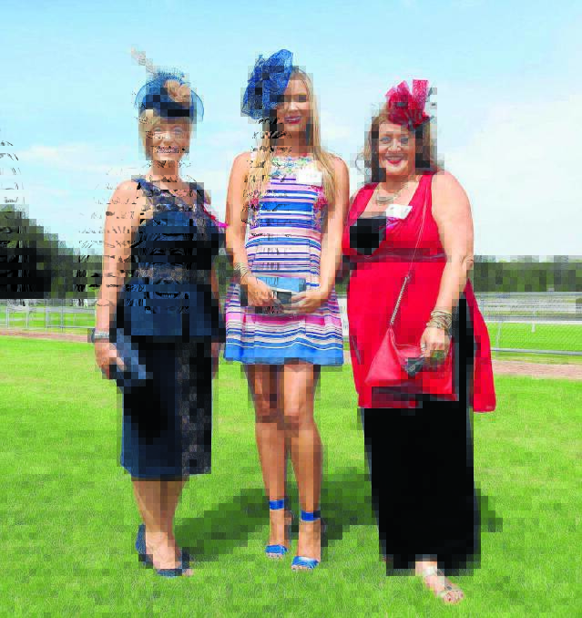 Fashion on the field winner, Talia Moy with judges Shirley Clarke and Bronwyn Wallace.
