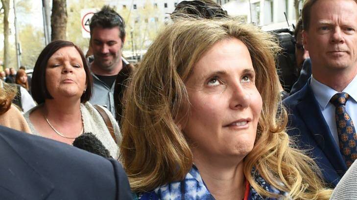Kathy Jackson rolls her eyes as she is yelled at outside Melbourne Magistrates Court.   Photo: Vince Caligiuri