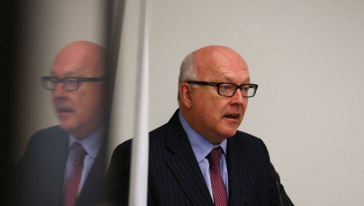 George Brandis: "Our law has a very specific definition of terrorism." Photo: Daniel Munoz