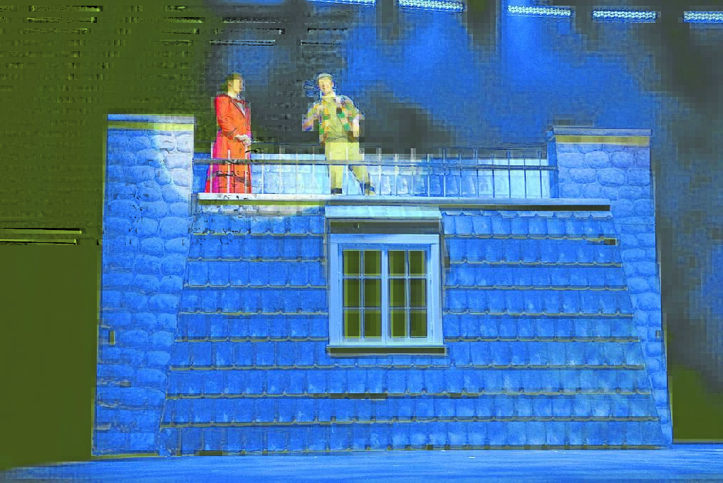 Elizabeth Hall as Mary Poppins and Jeremy Miller as Bert atop the rooftop set, which was constructed by members of the Old Bar Men's Shed.