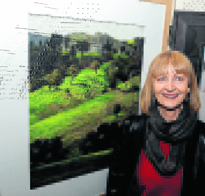 Artist Yvette Hugill with her work, Tamworth Landscape, which won the pastels section.