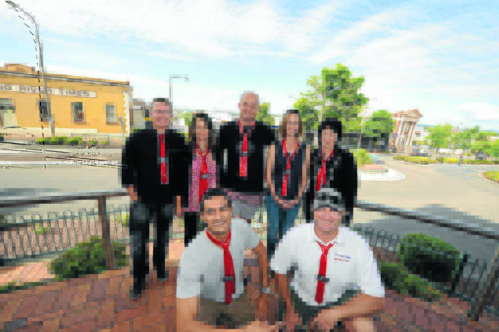 Red tie day in Taree: (Back) Carl Muxlow, Shaniane Andrews, Mick Mitchell, Claudine Small, Sue Jones, (front) Andrew Saunders and Phil Pilgrim wearing red ties to draw attention to youth homelessness in our valley.