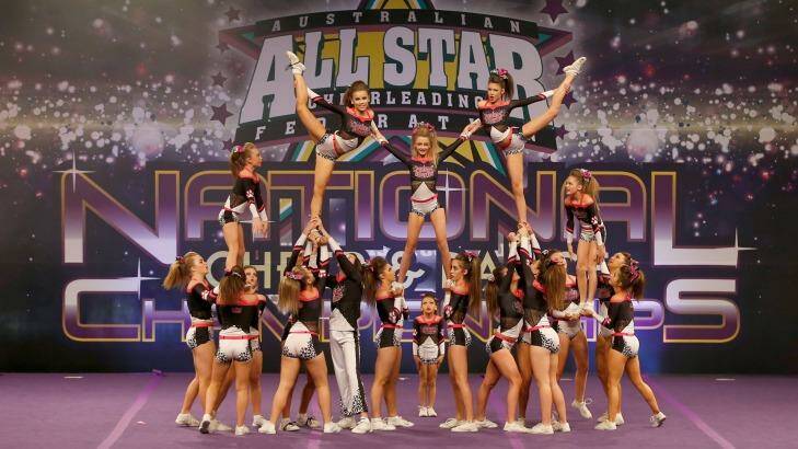 Perfect finish ... a team finale at the cheerleading championships. Photo: Darrian Traynor