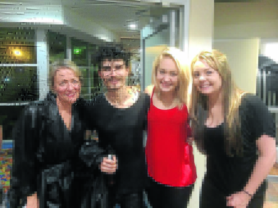 The decision to go home late after seeing Thirsty Merc at Club Taree presented Kim Shirono (left), Mel McLucas and Emily Creagan with the opportunity for a photo with front man, Rai Thistlethwayte.