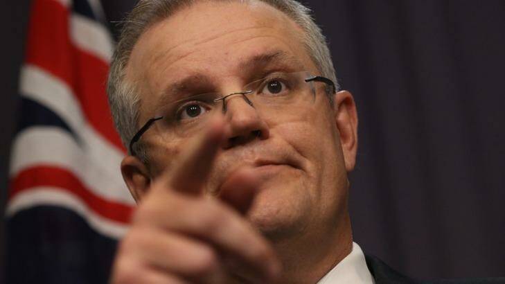Treasurer Scott Morrison during a press conference in Parliament House in Canberra on Friday. Photo: Andrew Meares